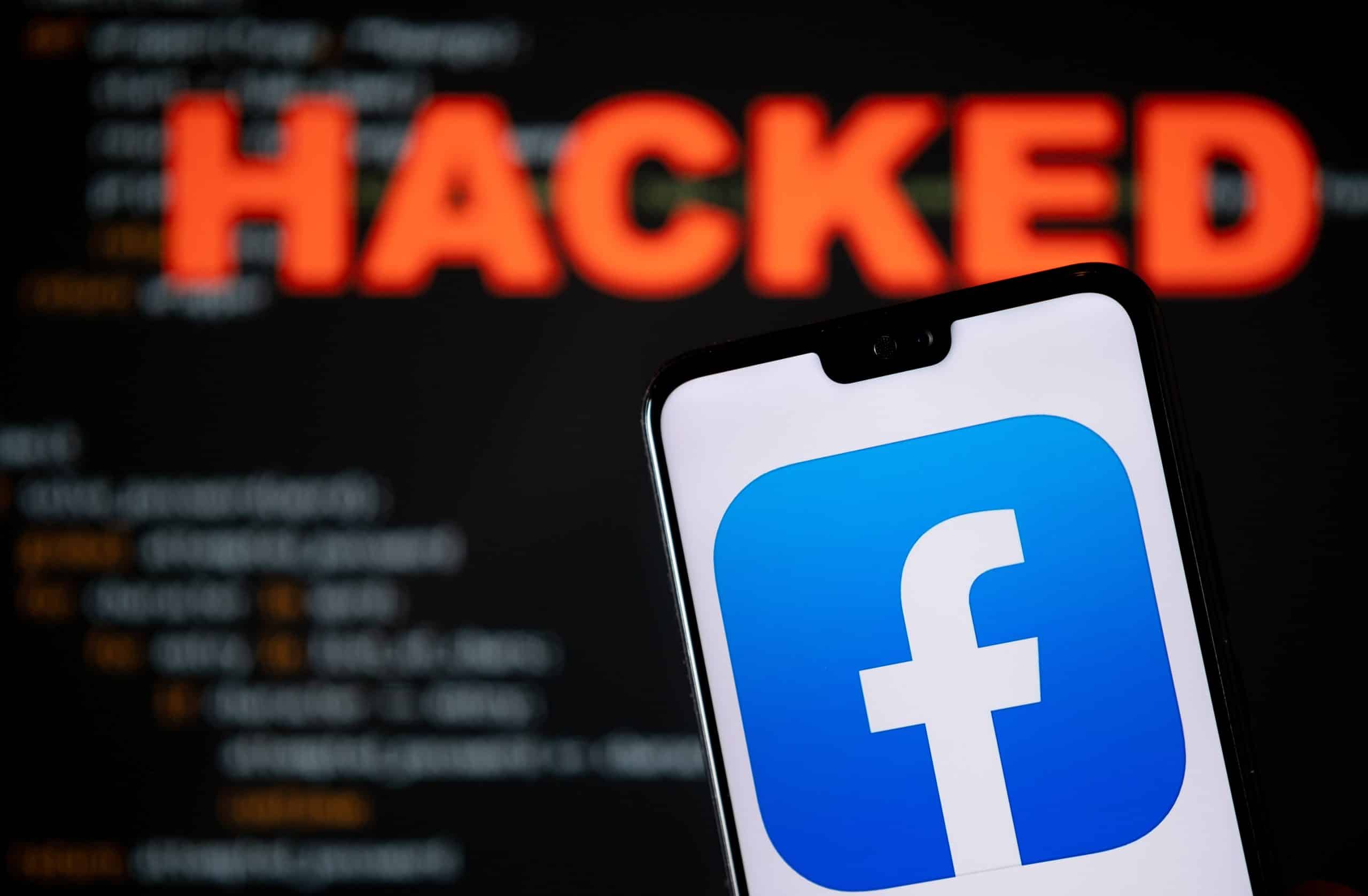 facebook on a phone with "hacked" in the background