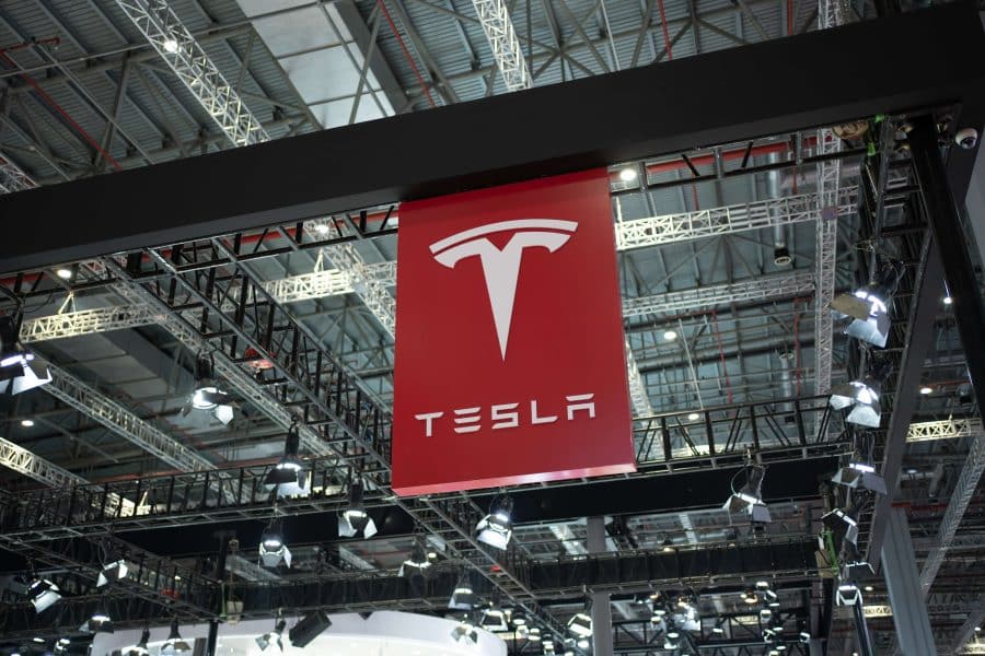 tesla logo at a factory