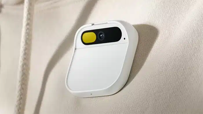 a humane ai pin attached to users' clothing