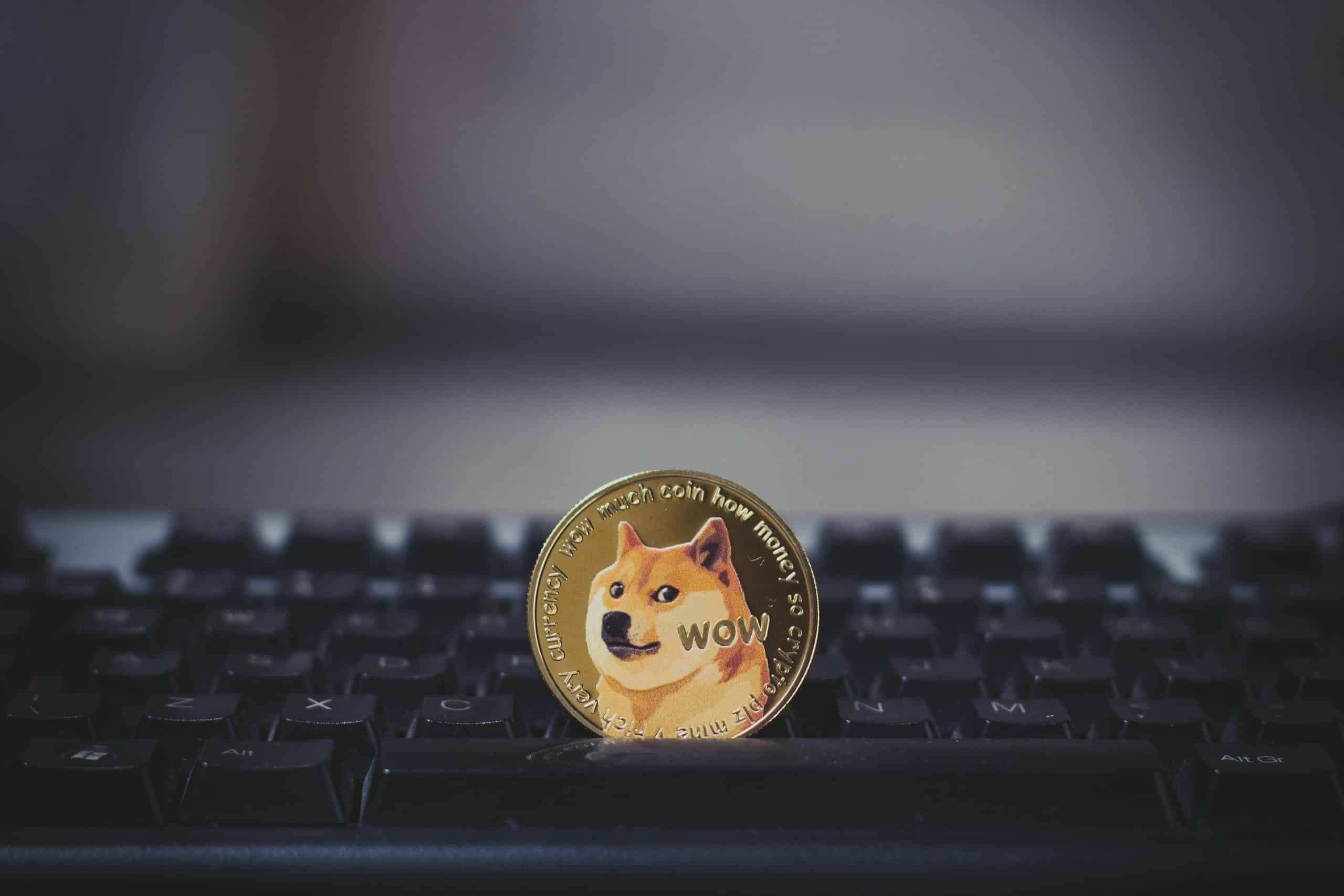 Dogecoin coin on a keyboard