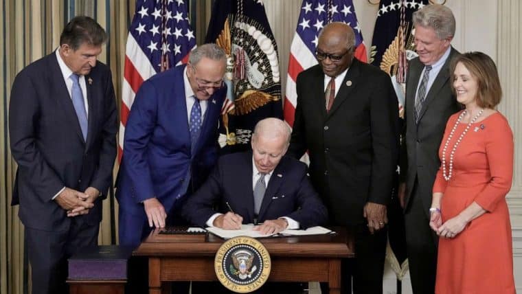 biden signed inflation act in 2022 to help the irs crack down on tax evasion