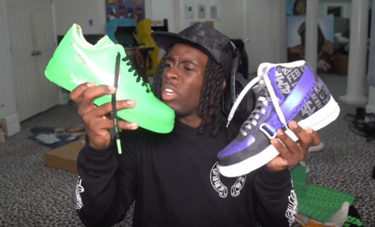 Kai Cenat holding sneakers
