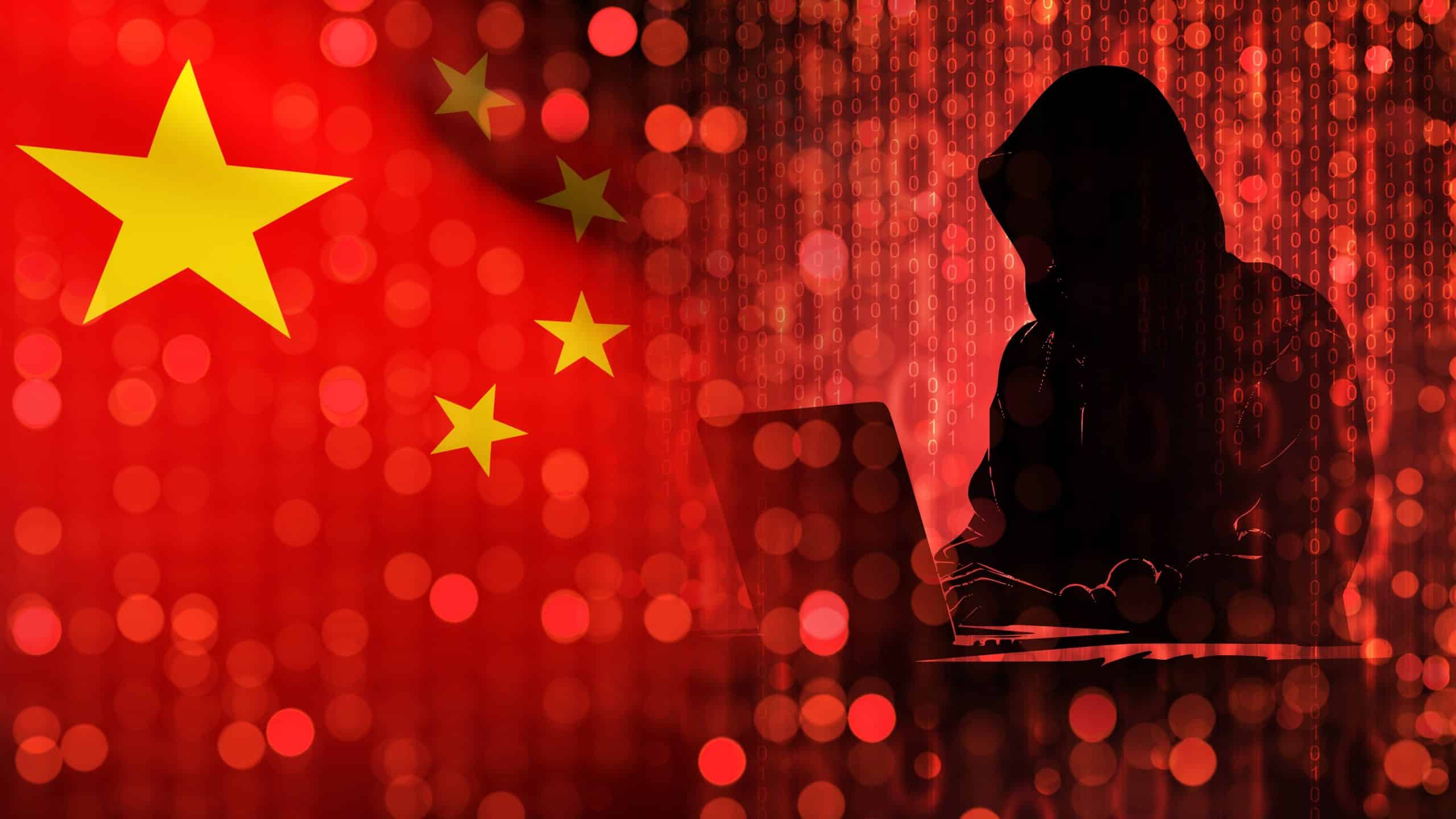 hacker next to Chinese flag